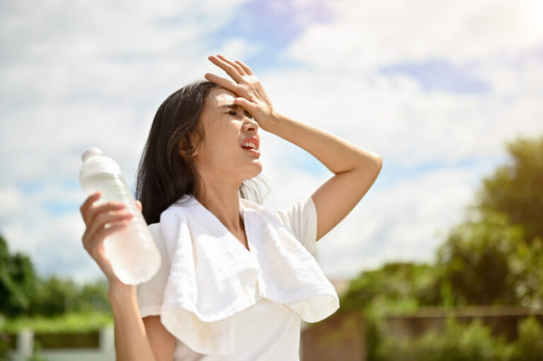 exhausted-asian-woman-is-fighting-heat-wave-while-running-park-sunny-day-1024x681-1