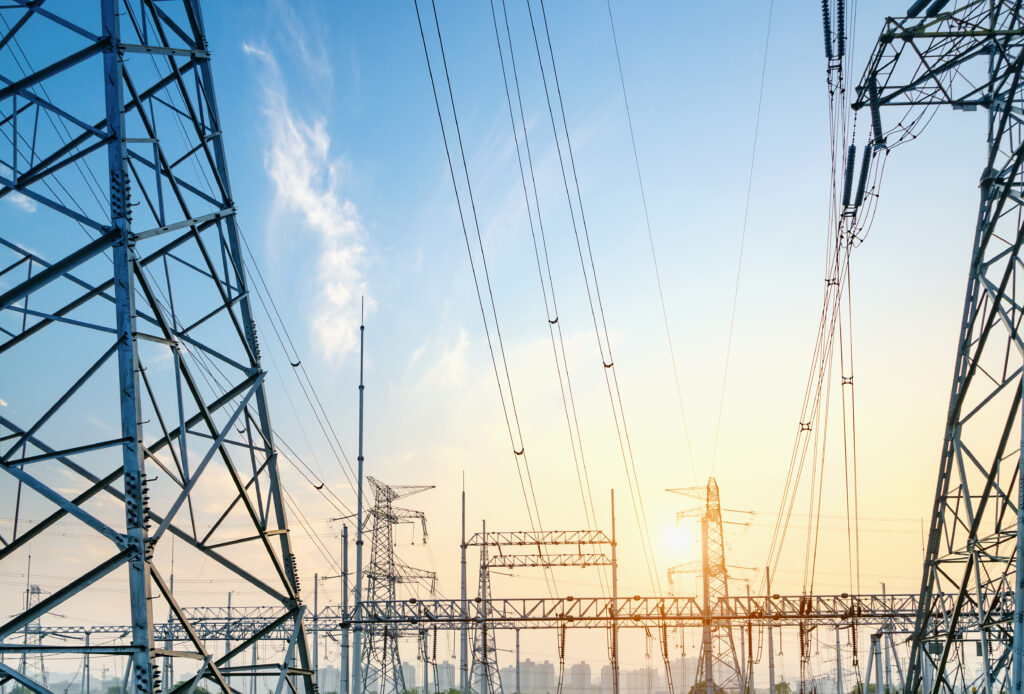 High pressure wire tower at sunset at dusk