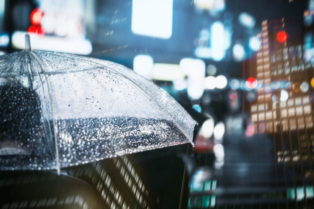 businessman-with-umbrella-rainy-city-1024x683-1