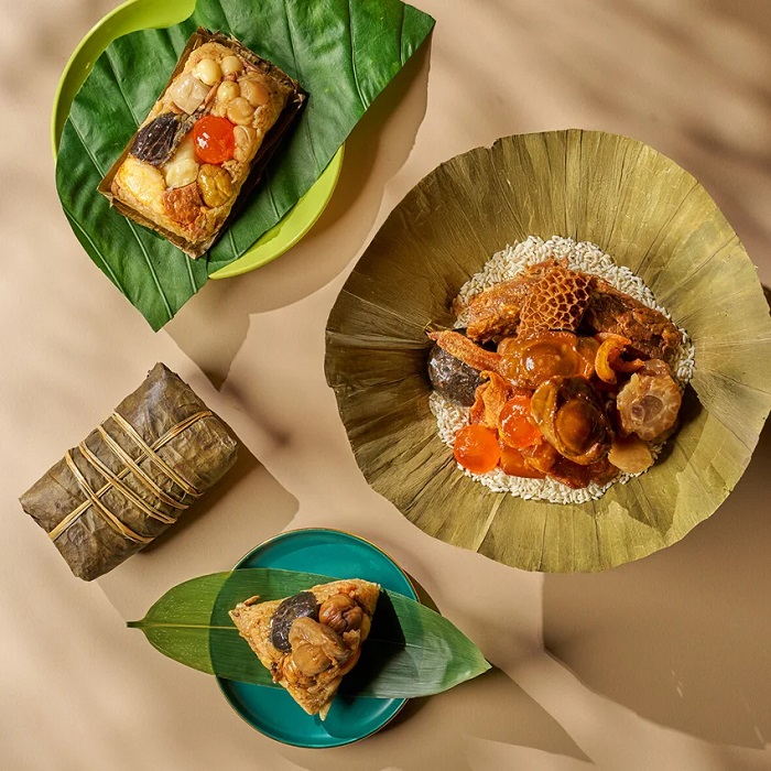 以江浙菜聞名的江南春餐廳，今年推出「古早味飄香粽」、「辣味犇粽」與「滬式鮑魚干貝粽」三款手工粽，兼具經典和創新風味　圖片來源：台北福華大飯店提供